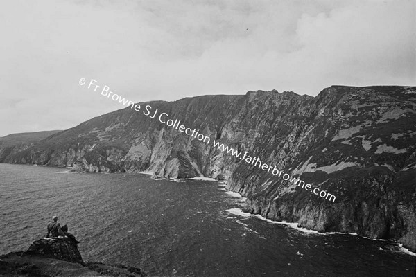 SLIEVE LEAGUE FROM BUNGLASS WITH MRS BYRNE IN FOREGROUND